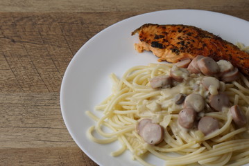 Spaghetti Carbonara with grilled salmon and herb by lemon