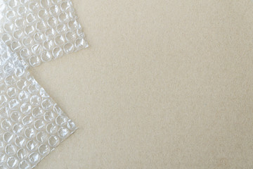 cardboard and bubble wrap for packing orders.