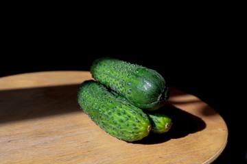 fresh green cucumbers with pimples