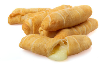 Tequeños cheese stick typical from Colombia and Venezuela in a white background.