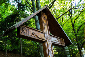 The source of Father Arsenie Boca. The housing for the candles near the spring. Romania , Sambata de Sus