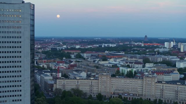 Aerial Drone flight over Leipzig by sunset with the MDR Building