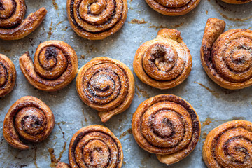 close up of cinnamon rolls with sugar