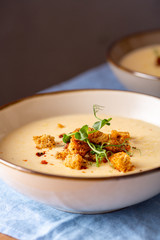 Sweet corn cream soup with croutons