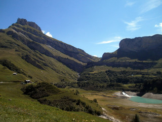 The mountains 'roches merles' (blackbirds rocks) and 'Rocher du vent' (Wind rock), reaching respectively 2,497 meters and 2,360 meters above sea level, located at the foot of Roselend Lake.