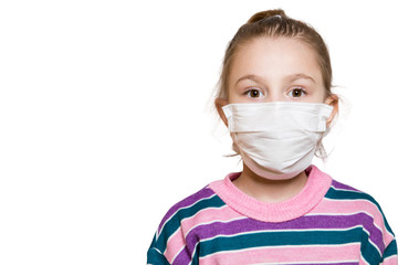 Closeup of the cute gilr kid in the protective mask.