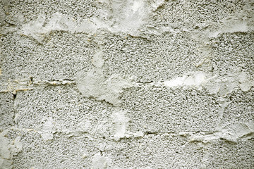 Building block layer texture. Unfinished wall background.