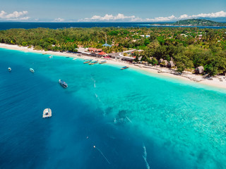 Tropical island with paradise beach and turquoise ocean. Aerial view of Gili Meno