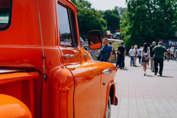 Orange pickup truck on a summer day © chdenisz
