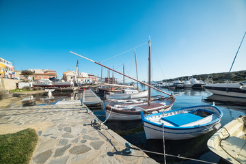 Fototapeta na wymiar Stintino small harbor on a clear day
