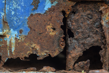 Old iron is full of rust and dust.