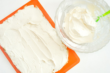 recipe step by step cream of whipped cream and mascarpone applied to a biscuit top view