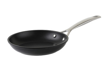 Black iron frying pan isolated on white
