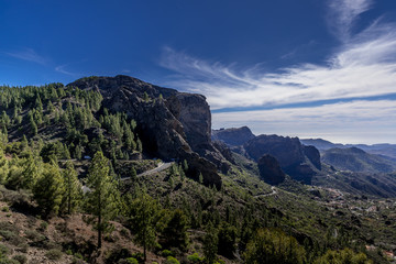 View of the tops of mountain ridges hills and rocks lining the landscape into the distance rises the ridges in the Canary Island National Park