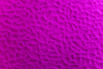 Textured bright pink paper. Abstract background image.