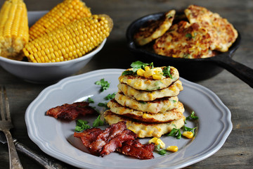 corn fritters  and Bacon. pancakes with corn. dish with corn.