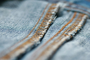 Jeans denim texture close up , focus only one point , soft blured background wallpaper