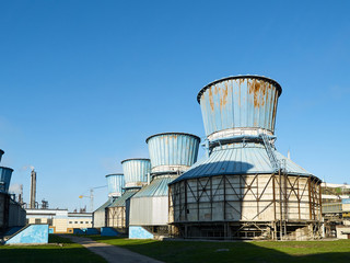 Industrial landscape with view of several ball gasholders with lightning protection and safety...