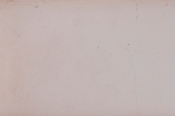 Texture of old pink cement wall with crack background
