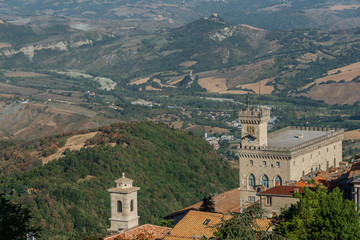 Aerial summer view of San Marino medieval town and castle with cloudy sky near Rimini Italy