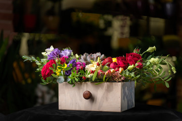 Beautiful wedding bouquet in a wooden box.