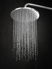 detail of water coming down from a shower head - obrazy, fototapety, plakaty