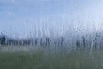 Blurred natural water drop window textured glass .