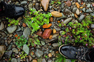 Hiking boots in a dry river bed