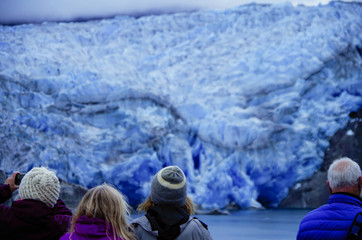 Passengers marvel at panoramic breathtaking view of Tempanos Glacier in the region of Los Glaciares...