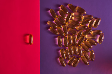 pills on a coloured background