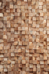 Natural light brown wooden wall texture with small bricks bars, vertical