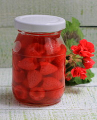 Jam of my grandmother styling strawberry jam in a glass jar