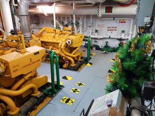 Christmas in vessel engine room with christmas tree