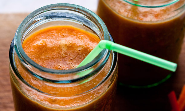 Pineapple, orange, granola and carrot smoothie