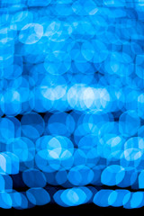 blue defocused garland lights, round bokeh. background image