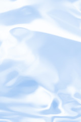 . Blue liquid shiny background.