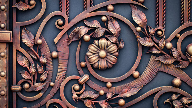 wrought-iron gates, ornamental forging, forged elements close-up