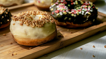 chocolate covered donuts with toppings