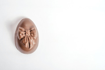Chocolate easter egg isolate on a white background with copy space. Happy easter.