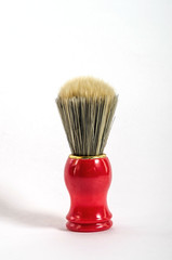 Red shaving brush isolated on a white background. Men's Accessories. For catalog