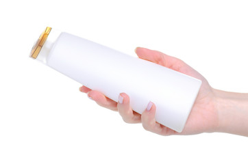 White bottle shampoo in hand beauty on white background isolation