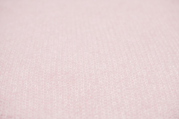 fluffy, knitted peach color texture