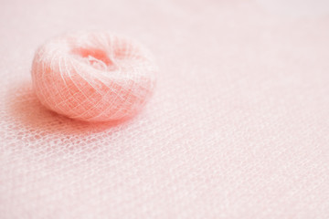 fluffy, knitted peach color texture