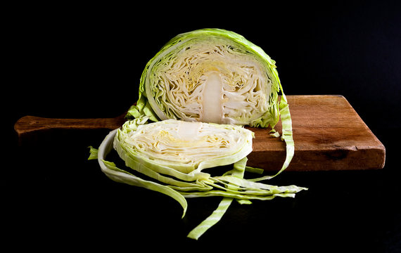 Sliced cabbage on cutting board