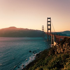 Golden Gate Bridge bathed in Golden Sunlight - obrazy, fototapety, plakaty