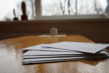 Bunch of envelopes lying down on the table