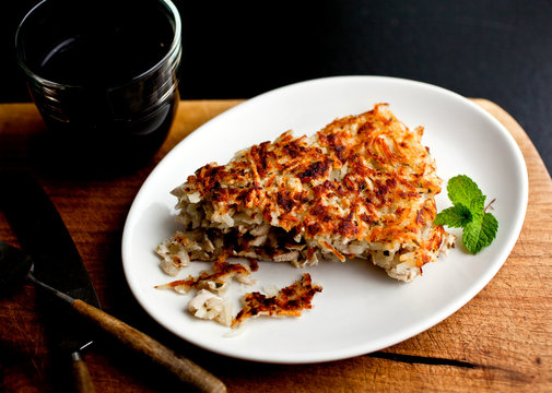Overhead view of potato&dagger;rosti&dagger;on plate