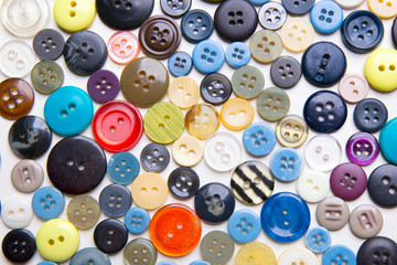 Many colored buttons on a white background
