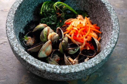 Bibimpap†with clams, kale, †daikon†and carrots