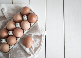 chicken eggs in a cardboard box
